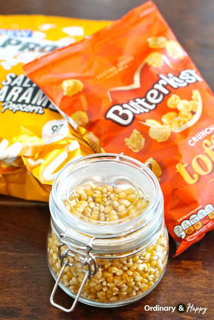 Popcorn kernels in a jar and packaged popcorn.