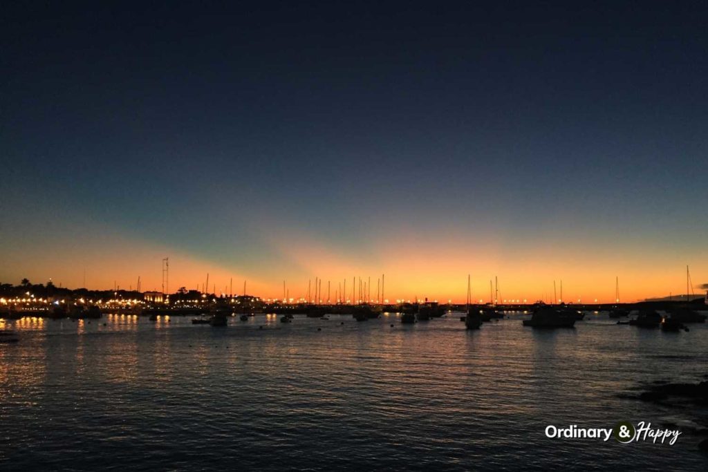 Sunset in Punta del Este by the water.