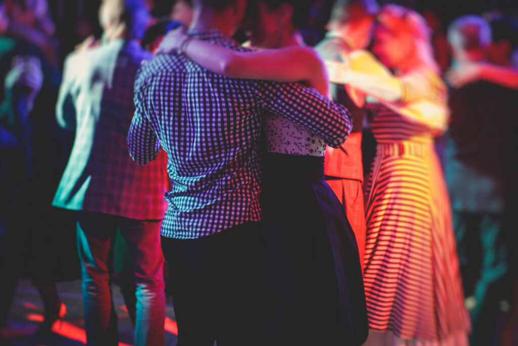 Couples dancing in a milonga