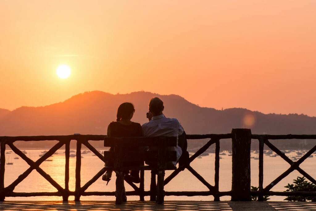 Couple watching the sunset.