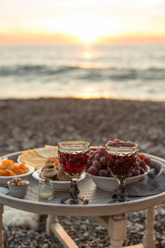 Picnic on the beach at sunset.