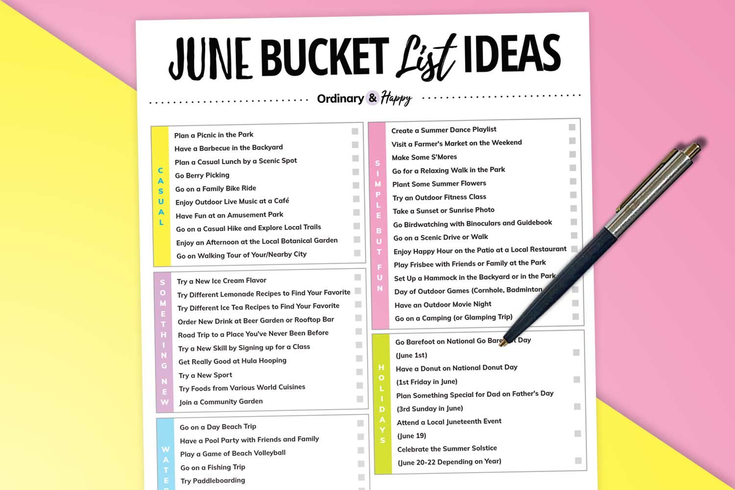 partially visible list of 50 things you can do in june on white paper next to a pen on colored background