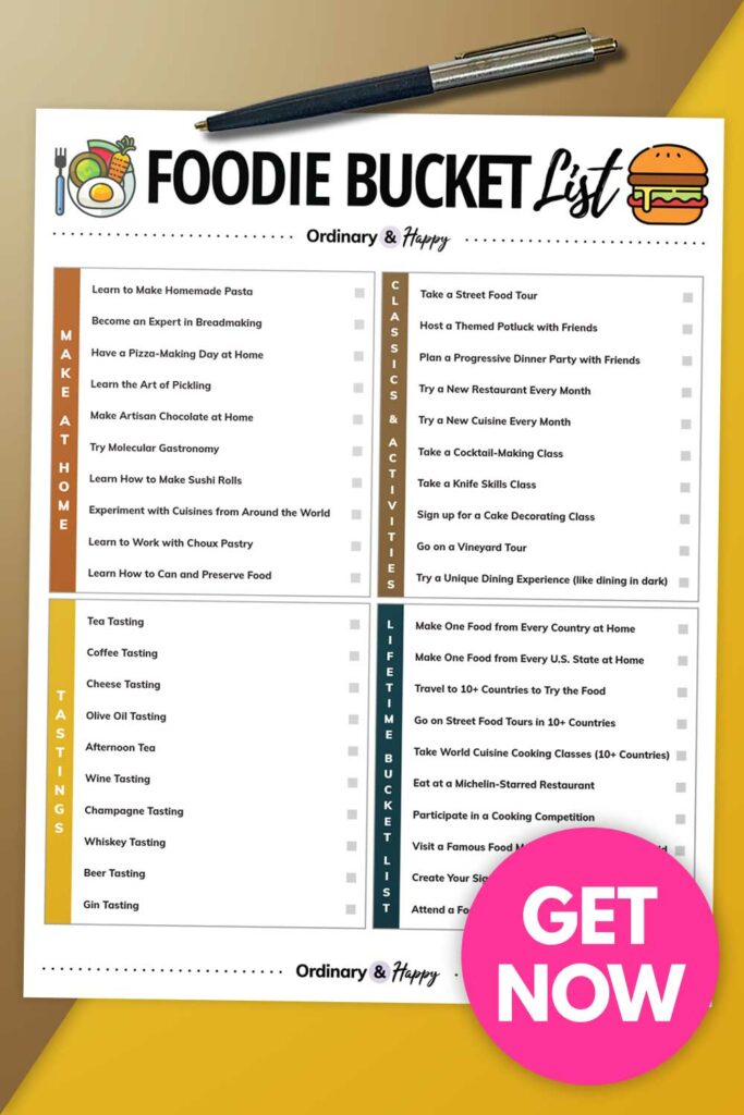 a foodie bucket list printable listing 40 ideas with a pen on a two color background