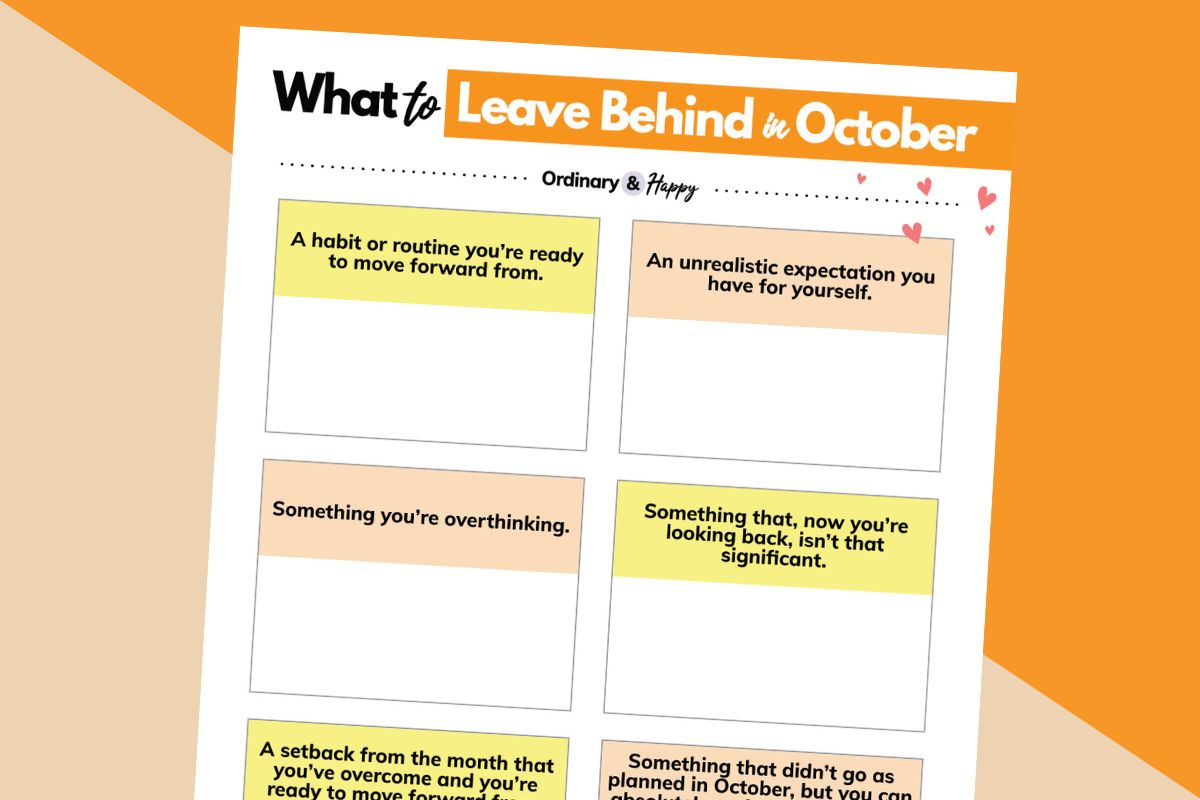 what to leave behind in october planner laid out on a light red and orange background