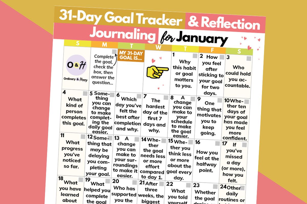 31-day january goal tracking calendar displayed on an orange and red 2-color background