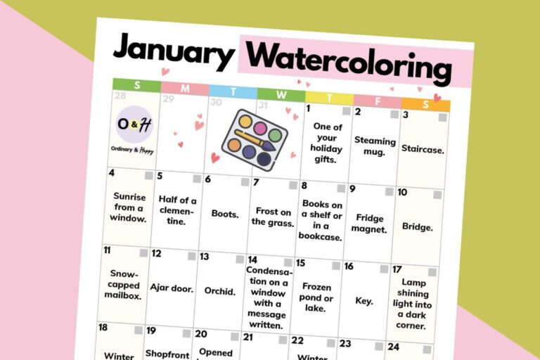 january watercoloring prompts calendar displayed on an orange and pink backdrop