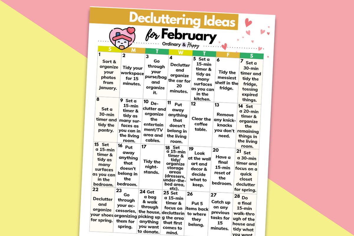 february decluttering calendar printable displayed tilted to the right on a light red and yellow background