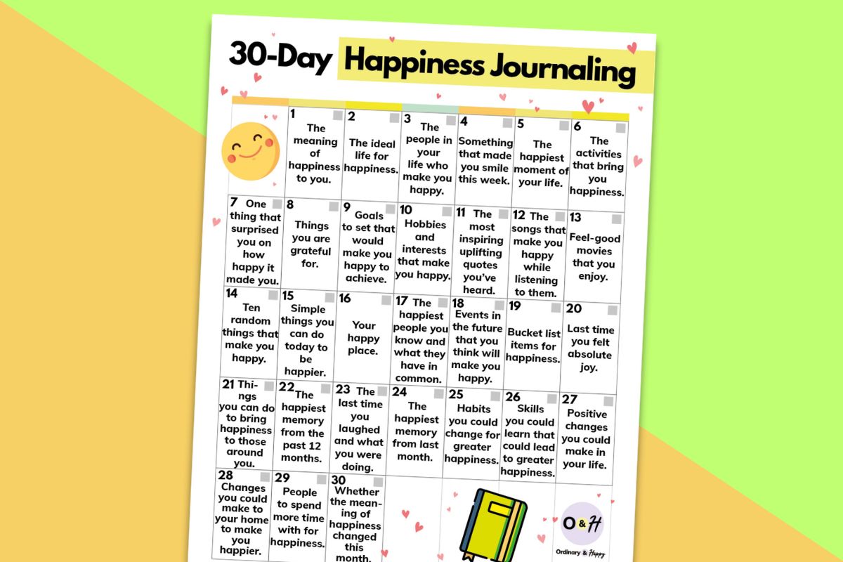 30-day happiness journaling calendar printable displayed on a 2-color diagonal orange and yellow background