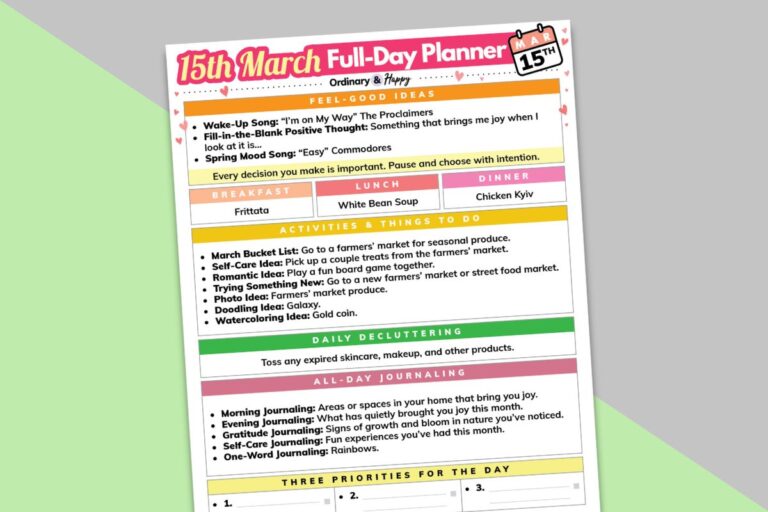 march 15th daily planner partially visible and tilted to the left displayed on a block color diagonal light green and red background