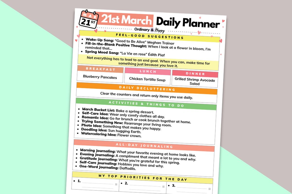 march 21st daily planner laid out on a teal and red-grey block color background