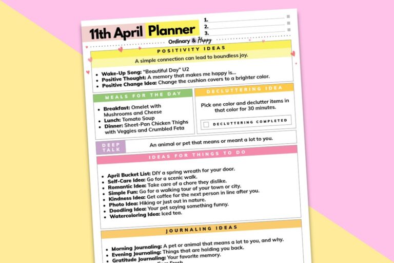 april 11th planner tilted to the left on a diagonal dandelion and lilac colored background
