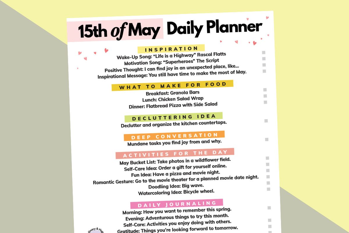 15th may daily planner tilted to the left on a 2-color diagonal yellow and red-yellow background