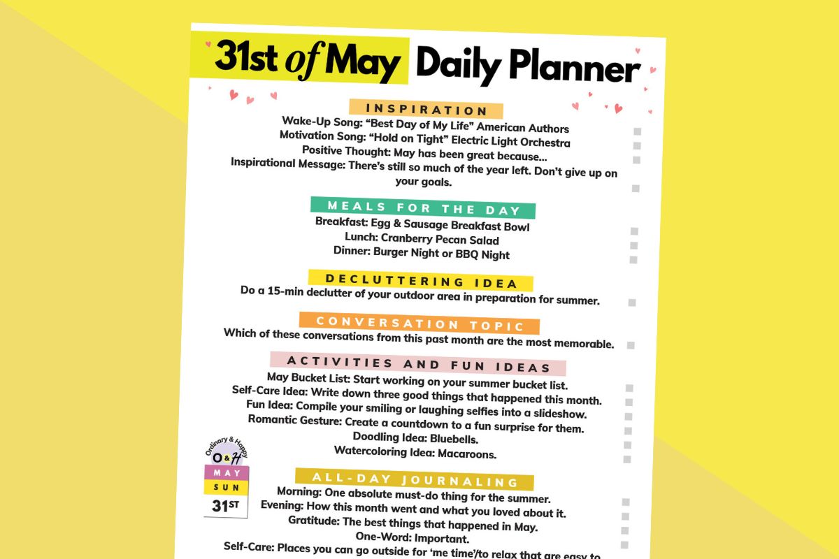 may 31st daily planner printable tilted to the right displayed on a block yellow 2-color backdrop