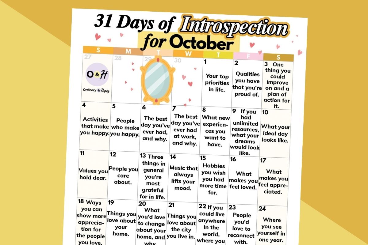 october introspection calendar displayed on a yellow-grey and orange backdrop tilted to the right