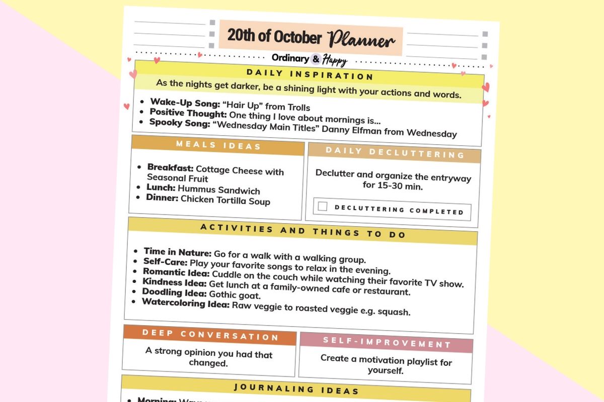 october 20th daily planner tilted to the right on a diagonal yellow and light red background